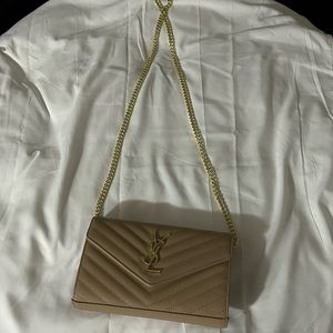 Certified authentic brand new YSL clutch Crossbody